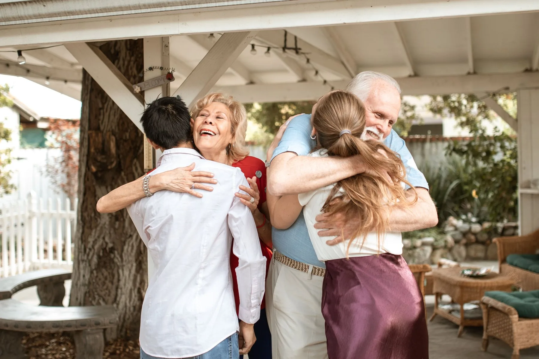 Two generations of a family embracing outdoors