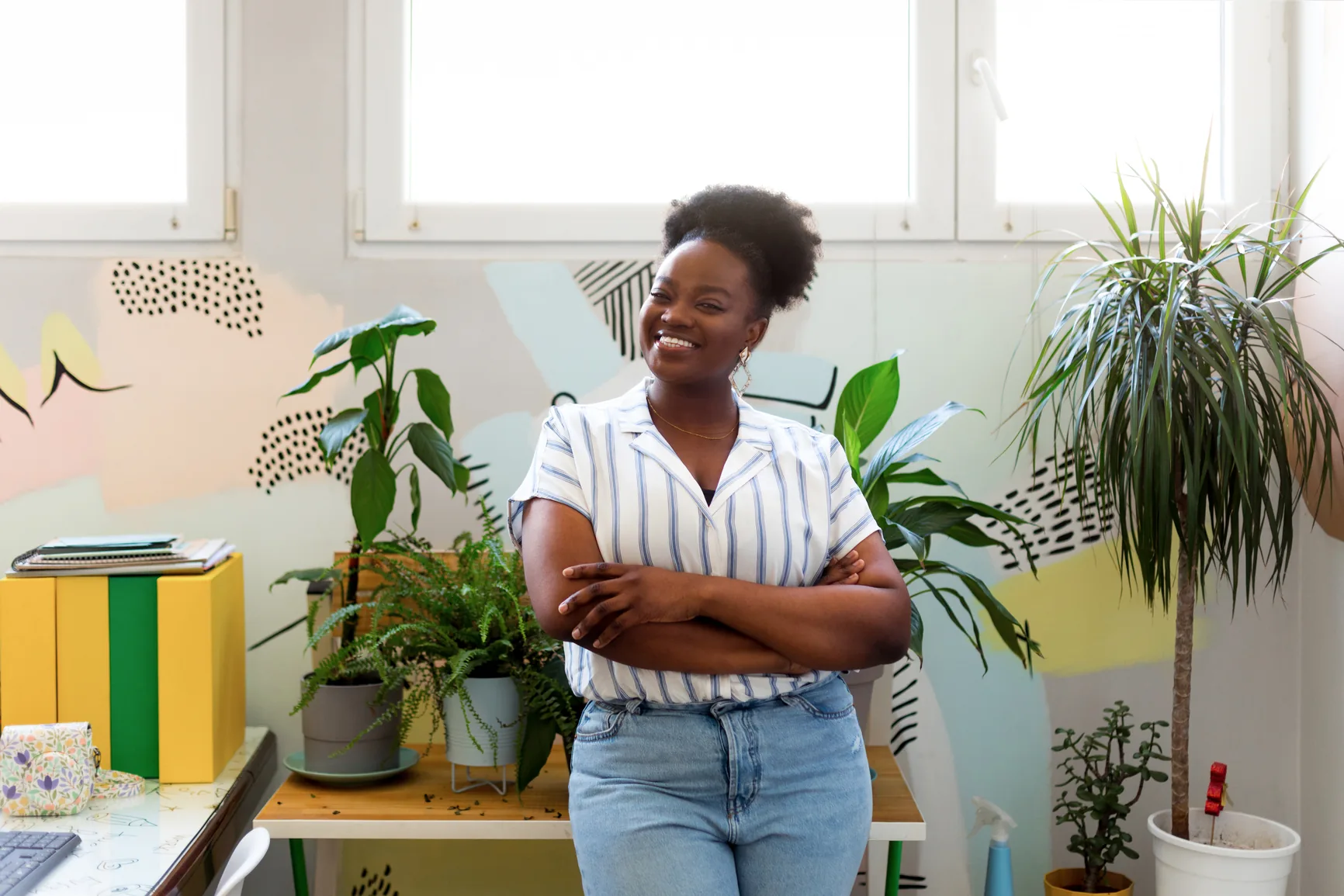 A smiling care guide seated in an office